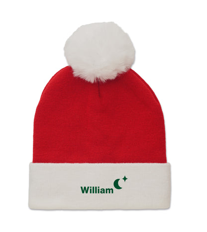 Weihnachtliche Strickmütze mit Bündchen und Bommel aus elastischem Acryl.
