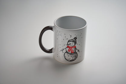 Becher aus Keramik mit saisonalem Dekor. Inkl. passender Geschenkkarton. Füllmenge: 300 ml.