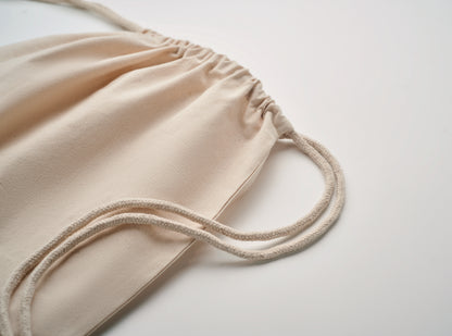 Beutel mit Kordelzug aus Fairtrade-Baumwolle. 180 g/m².