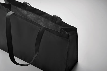 Einkaufs- oder Strandtasche aus RPET-Non Woven mit Seitenfalz und langen Tragegriffen. 80