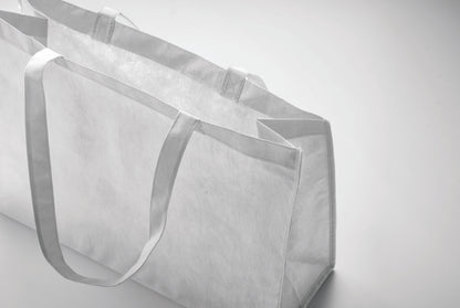 Einkaufs- oder Strandtasche aus RPET-Non Woven mit Seitenfalz und langen Tragegriffen. 80