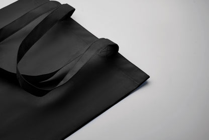 Einkaufs- oder Strandtasche aus RPET-Non Woven mit Seitenfalz und langen Tragegriffen. 80