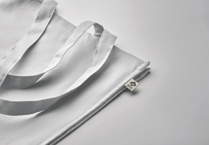 Einkaufstasche aus Organic Cotton mit langen Tragegriffen und Bodenfalz. 220 g/m².