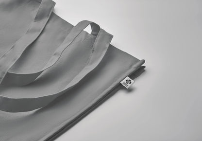 Einkaufstasche aus Organic Cotton mit langen Tragegriffen und Bodenfalz. 220 g/m².
