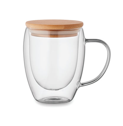 Doppelwandiges Borosilikatglas mit Henkel. Deckel aus Bambus. Füllmenge: 250 ml.