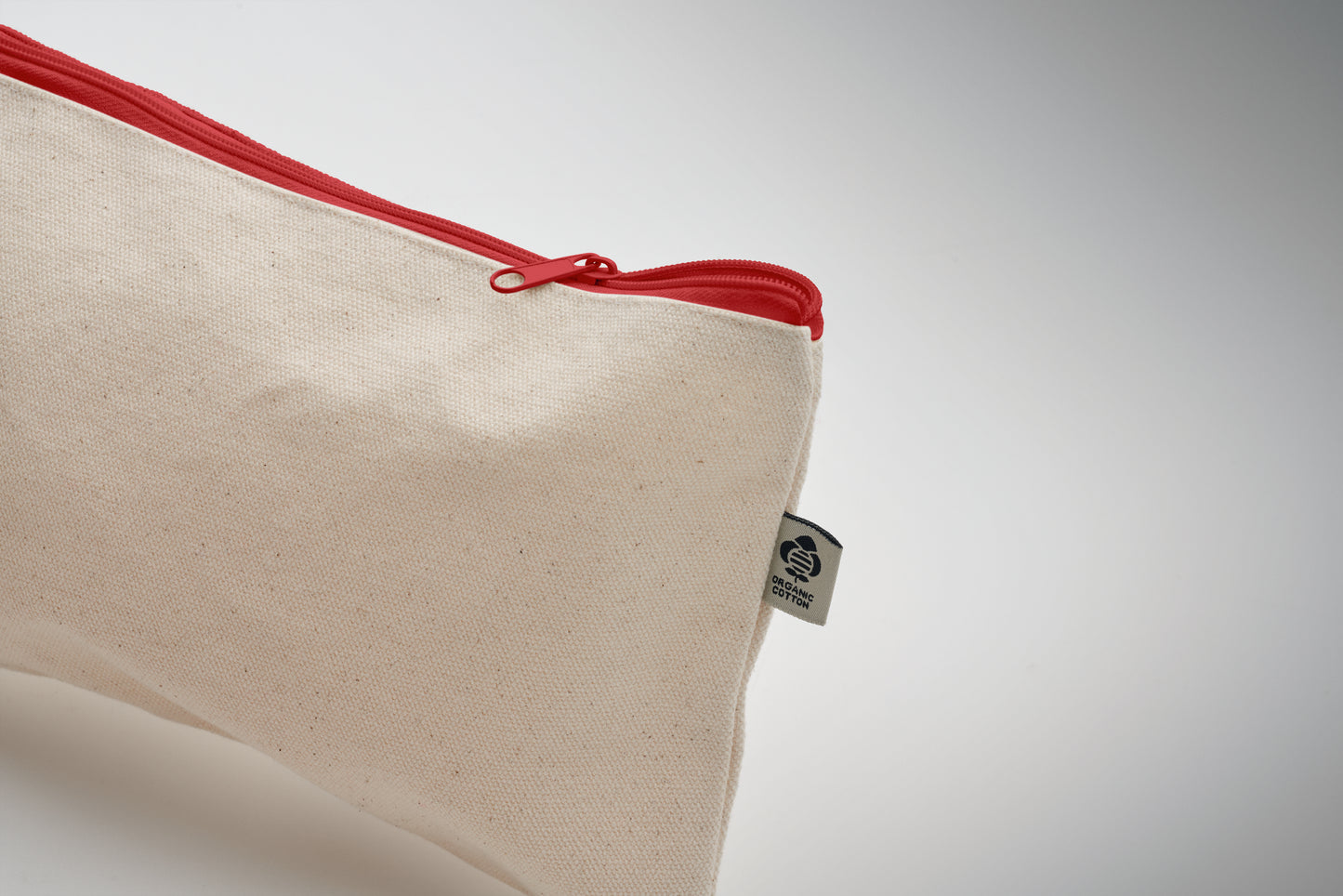 Kosmetiktasche aus Organic Cotton mit farbigem Reißverschluss. 340 g/m².