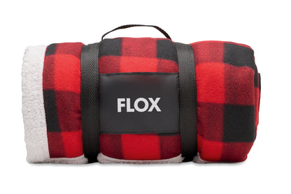 Fleece-Decke aus RPET-Polarfleece (180 g/m²). Rückseite aus Polyester-Sherpa (230 g/m²). Inkl. RPET-Nylon-Tragegriff.