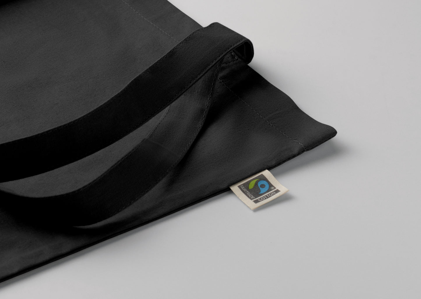 Einkaufstasche aus Fairtrade-Baumwolle mit langen Tragegriffen. 180 g/m².