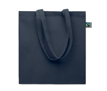 Einkaufstasche aus Fairtrade-Baumwolle mit langen Tragegriffen und Bodenfalz. 180 g/m².