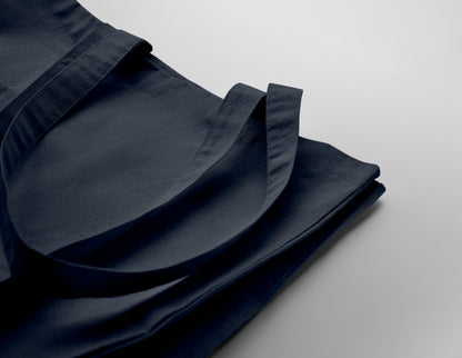 Einkaufstasche aus Fairtrade-Baumwolle mit langen Tragegriffen und Bodenfalz. 180 g/m².