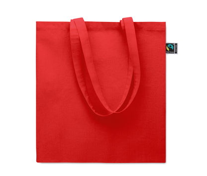 Einkaufstasche aus Fairtrade-Baumwolle mit langen Tragegriffen und Bodenfalz. 180 g/m².