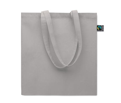 Einkaufstasche aus Fairtrade-Baumwolle mit langen Tragegriffen und Bodenfalz. 180 g/m².