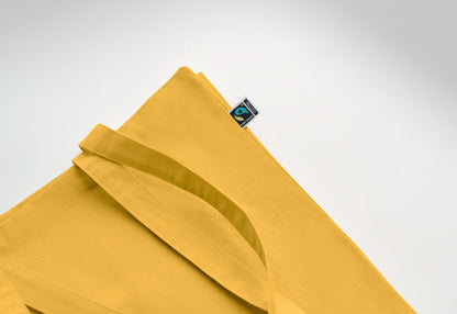 Einkaufstasche aus Fairtrade-Baumwolle mit langen Tragegriffen und Bodenfalz. 180 g/m².