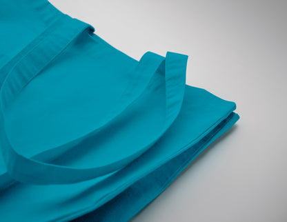 Einkaufstasche aus Fairtrade-Baumwolle mit langen Tragegriffen und Bodenfalz. 180 g/m².