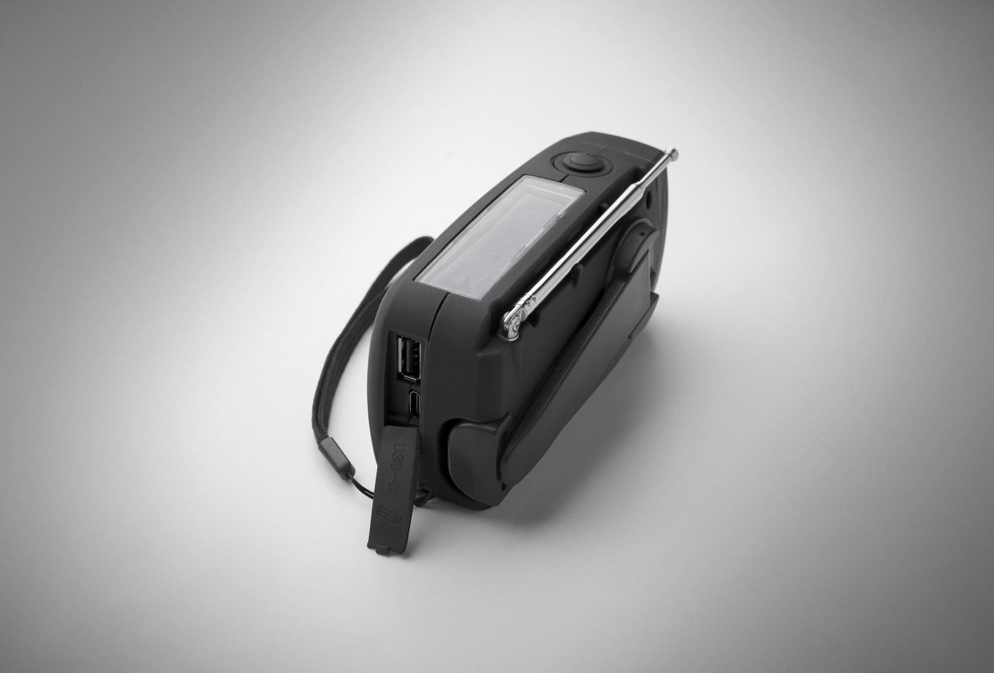 Tragbares AM/FM-Radio mit LED-Taschenlampe (2 Einstellungen) und 1200mAh Powerbank zum Notfall-Aufladen. Aufladen