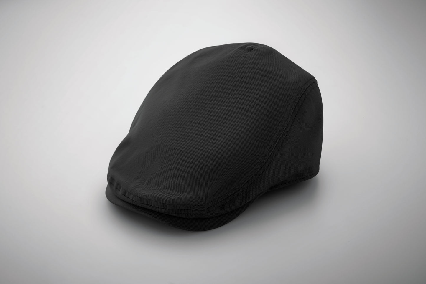 Flache Newsboy-Kappe aus 235 g/m² Baumwolle mit Metallverschluss.