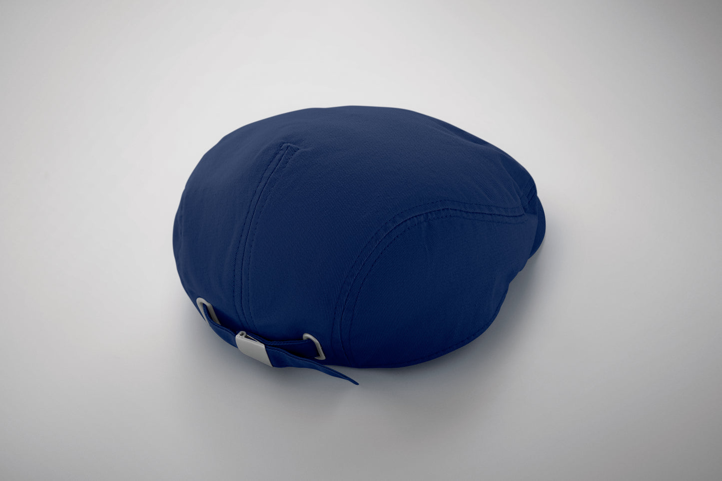 Flache Newsboy-Kappe aus 235 g/m² Baumwolle mit Metallverschluss.