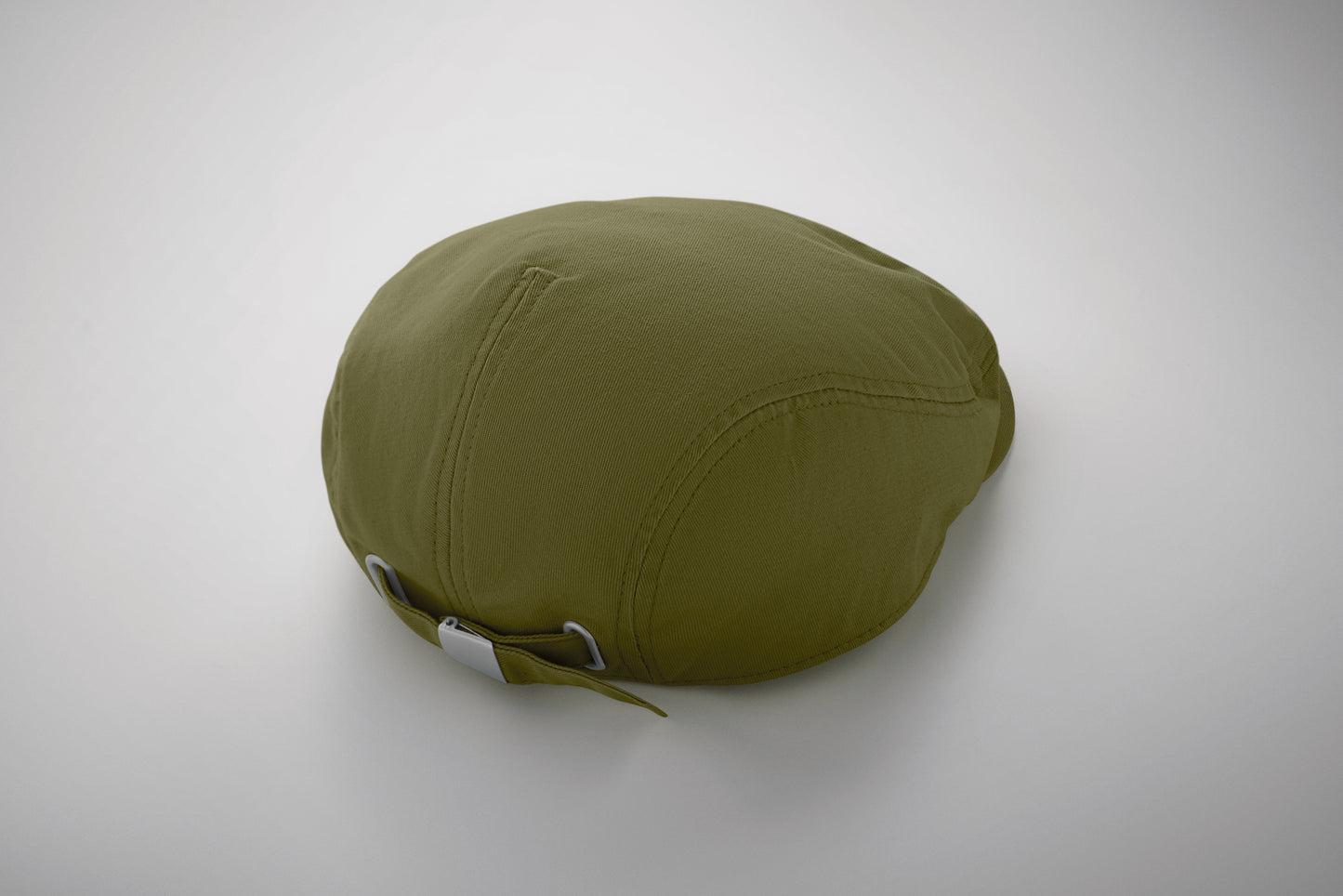 Flache Newsboy-Kappe aus 235 g/m² Baumwolle mit Metallverschluss.