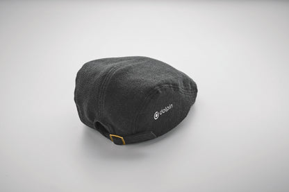 Flache Newsboy-Kappe aus meliertem 335 g/m² Polyester mit Metallverschluss.