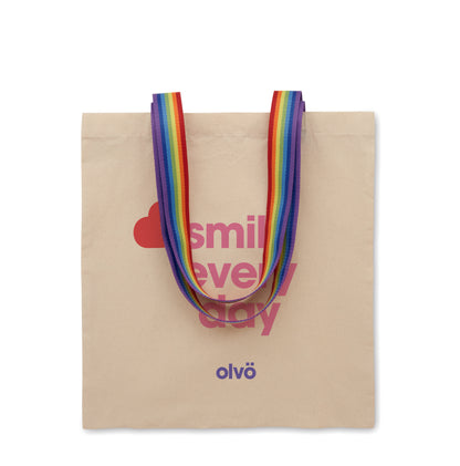 Einkaufstasche aus Baumwolle 180 g/m². Tragegriffe in Regenbogenfarben. Max. Traglast: 2 5