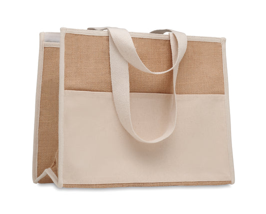 Diese Shopping Tasche aus Jute hat lange Tragegriffe. Das Innere ist laminiert
