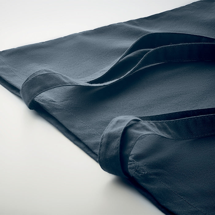 Einkaufstasche aus Organic-Cotton mit langen Tragegriffen. Reaktivfärbung. Im klassischen Design ist sie