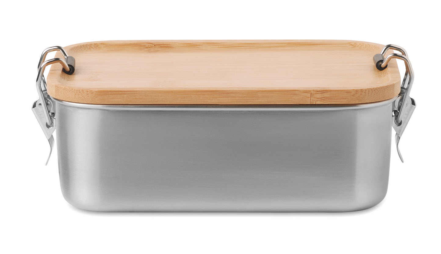 Lunchbox aus Edelstahl mit Deckel aus Bambus und Halteklammern. Füllmenge: 750 ml.