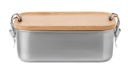 Lunchbox aus Edelstahl mit Deckel aus Bambus und Halteklammern. Füllmenge: 750 ml.