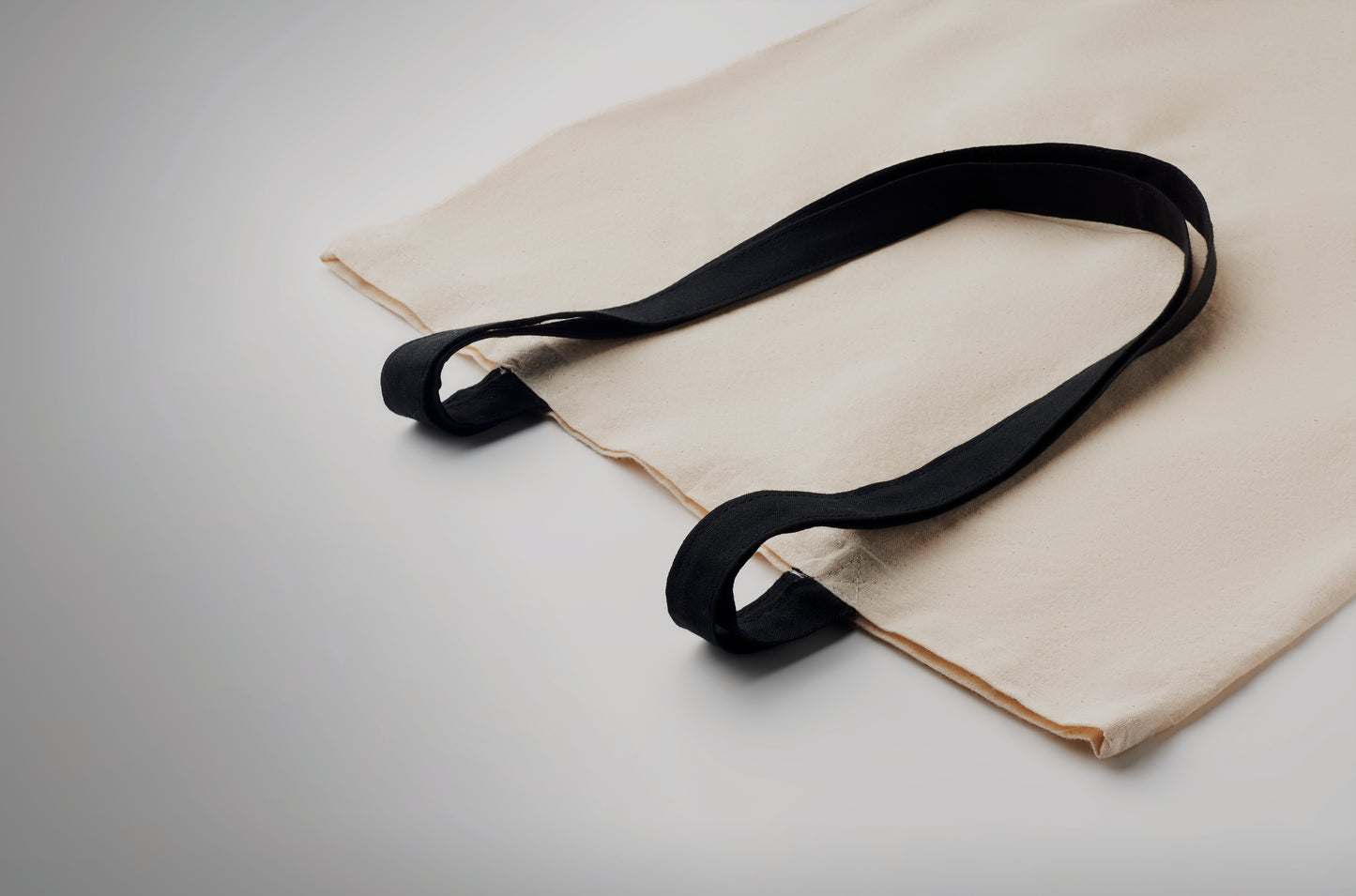 Einkaufstasche aus Baumwolle mit langen farbigen Tragegriffen. 140 g/m². Diese Tasche ist
