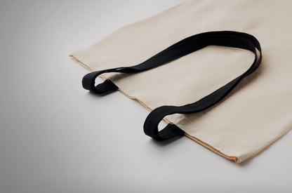 Einkaufstasche aus Baumwolle mit langen farbigen Tragegriffen. 140 g/m². Diese Tasche ist