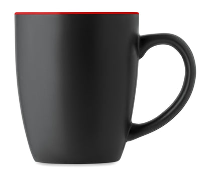 Schwarzer Kaffeebecher aus matter Keramik. Glänzende farbige Innenseite. Füllmenge: 290 ml. Mit