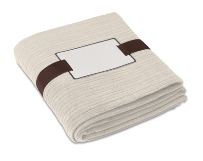 Softe Fleece-Decke 240 g/m². Inkl. Band mit bedruckbarer Karte.